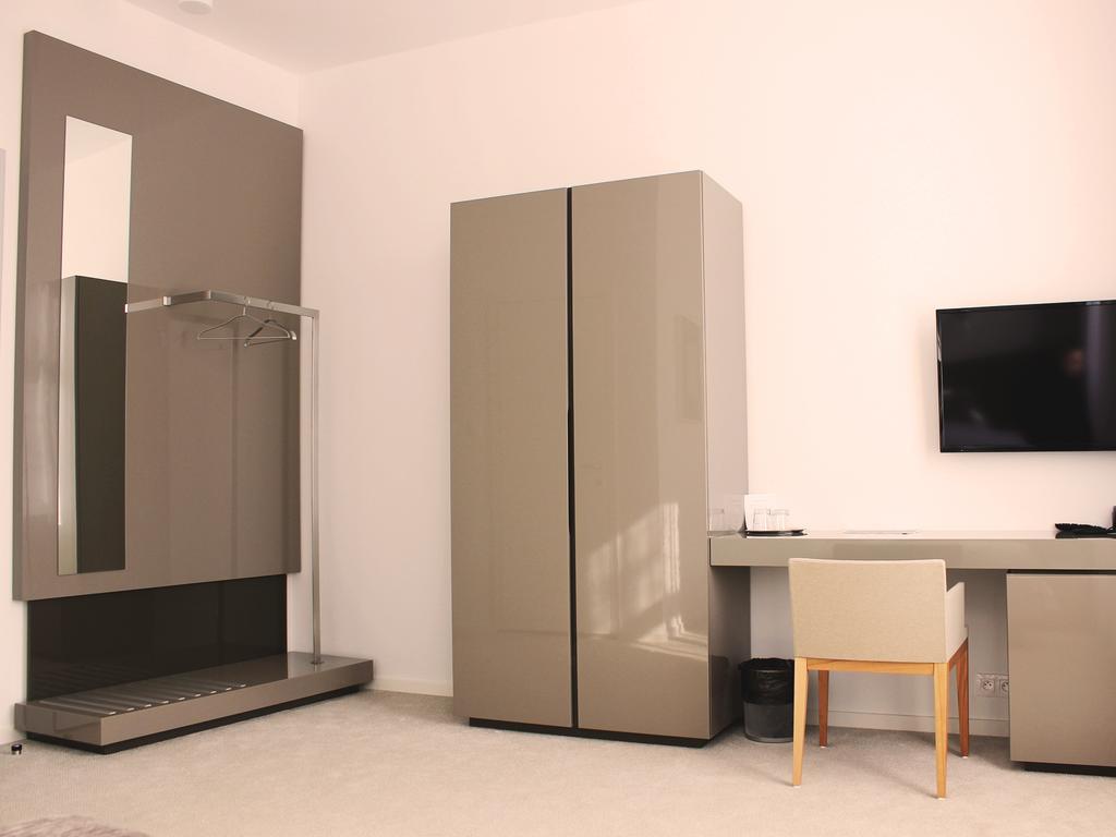 Hotel Lev Levice Quarto foto