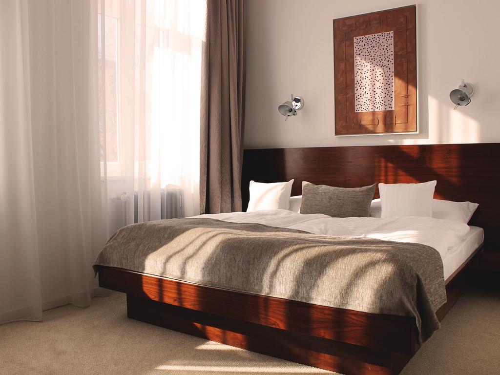 Hotel Lev Levice Quarto foto