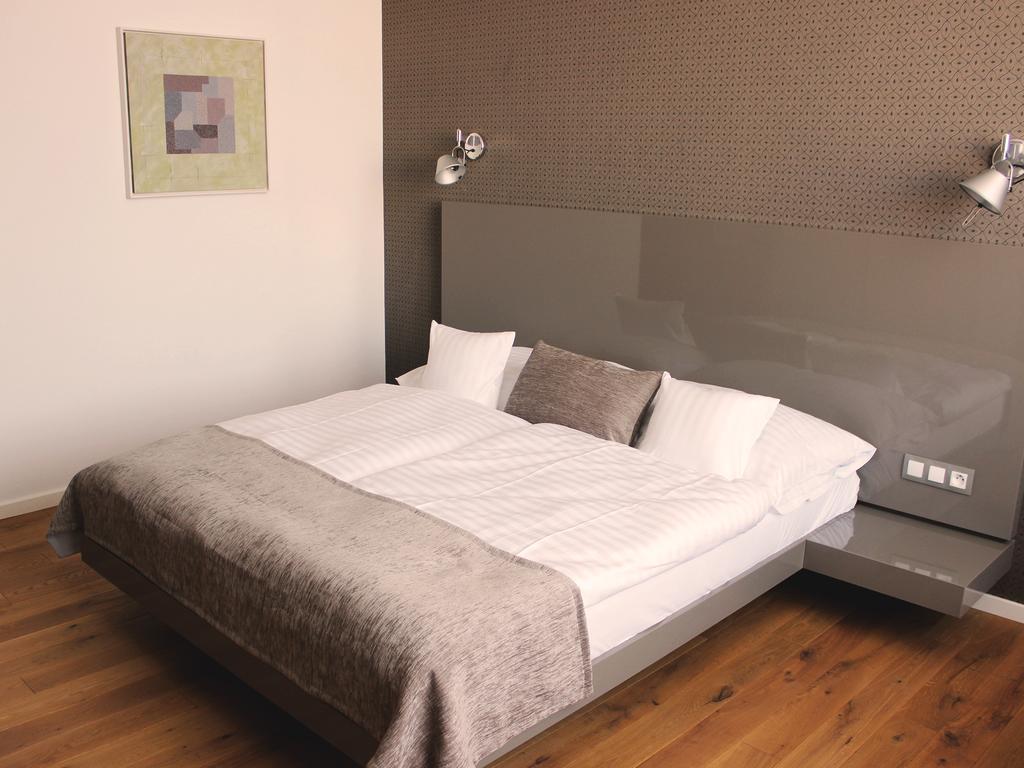 Hotel Lev Levice Quarto foto